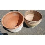 Two similar large terracotta garden pots