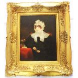 An ornate gilt gesso framed re-lined oil on canvas portrait of a seated lady with lace headdress -