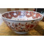 A modern Chinese porcelain bowl with iron red enamel decoration