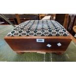 A Victorian mahogany box framed foot stool with upholstered top, set on bun feet