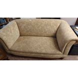 A 1.7m 20th Century Chesterfield settee with machine tapestry upholstery, set on turned front legs