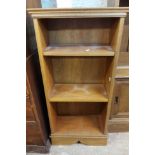 A 48.5cm stained mixed wood three shelf open bookcase