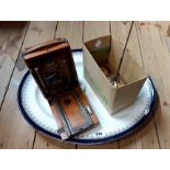An antique Koilos bellows camera with wooden case, brass fittings and leather bellow - sold with a