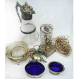 A box containing a quantity of silver plated items including claret jug, cruets and cut glass