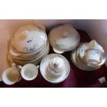 A quantity of Royal Doulton bone china tea and dinner ware decorated in the Juliette pattern