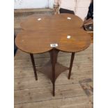 A 52cm Edwardian mahogany and strung occasional table with quatrefoil top, slender supports and