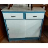 A 92cm mid 20th Century kitchen cabinet with Formica top, two frieze drawers and sliding cupboard