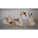 Two Beswick Waterline swan figurines (Model Numbers 1683 and 1684) - sold with a small Szeiler