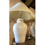 A pair of large ceramic Aimbry table lamps of lidded jar form with paint effect finish, each with