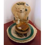 Five pieces of Wade pottery and porcelain including 1998 Swap Meet Teddy bear figurine, decorated