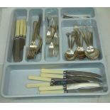 A plastic cutlery tray containing a quantity of assorted silver plated cutlery