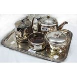 A silver plated harlequin three piece tea set - sold with a tray and a wine coaster