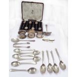 A cased set of six silver coffee bean spoons, a set of four silver teaspoons and three assorted