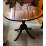 A 53.5cm Bevan Funnell 'Reprodux' mahogany and cross banded oval tilt-top wine table, set on