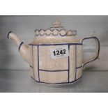 An early 19th Century Castleford style teapot with sliding lid and blue highlighting - a/f
