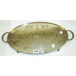 A silver plated oval tea tray with central inscription