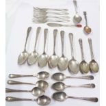 Twelve matching marked 'sterling' teaspoons - sold with four silver cake forks, two others with golf