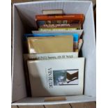 A box containing a quantity of assorted books and Ordnance Survey maps including railway related,