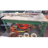 A 1.7m vintage work bench, set on a green and orange painted base