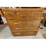 A 1.03m early 20th Century Maple & Co. mahogany and strung chest with large central deep drawer,