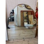 A vintage frameless mirror with shaped bevelled plate - from a dressing table
