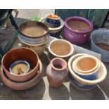 A large quantity of assorted garden pots of varying design