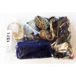 A bag containing a quantity of old and vintage jewellery including banded agate, jet and other items