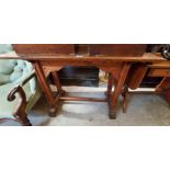 A 1.13m late Victorian pitch pine Gothic Revival side table with moulded brackets and flanking