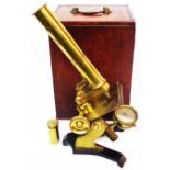 A 19th Century brass microscope marked for J.A. Steward of London in original fitted wooden case,