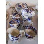 A Victorian part tea set decorated in the Amhurst pattern including cups and saucers, plates, etc.