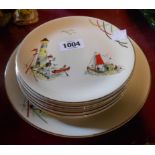 A vintage Alfred Meakin sandwich set comprising one large and six smaller plates decorated in the