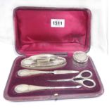 A leather cased silver mounted manicure set - Birmingham 1913