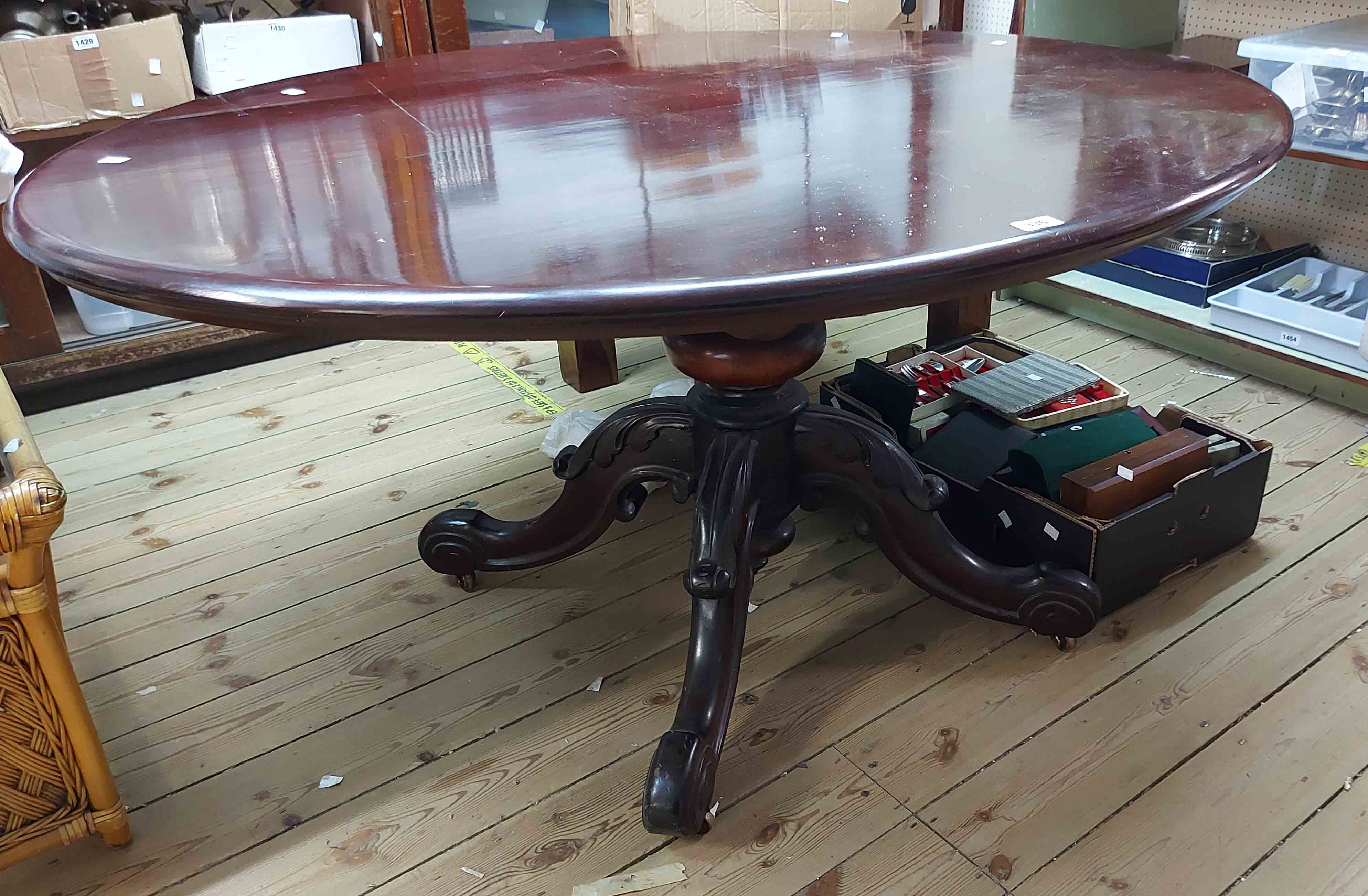 A 1.4m Victorian mahogany tilt-top breakfast table with moulded oval top, set on massive turned - Image 2 of 3