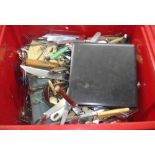 A crate containing a quantity of silver plated and other items - mostly cutlery