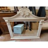 A 1.1m reproduction white finish overmantel mirror with scroll pediment and flanking acanthus