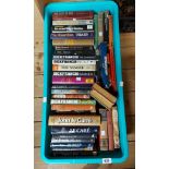 A crate containing a collection of hardback novels including Dick Francis, John Le'Carre, Simenon