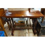 A 97cm late Victorian mahogany and strung side table, set on twin flanking bobbin turned supports