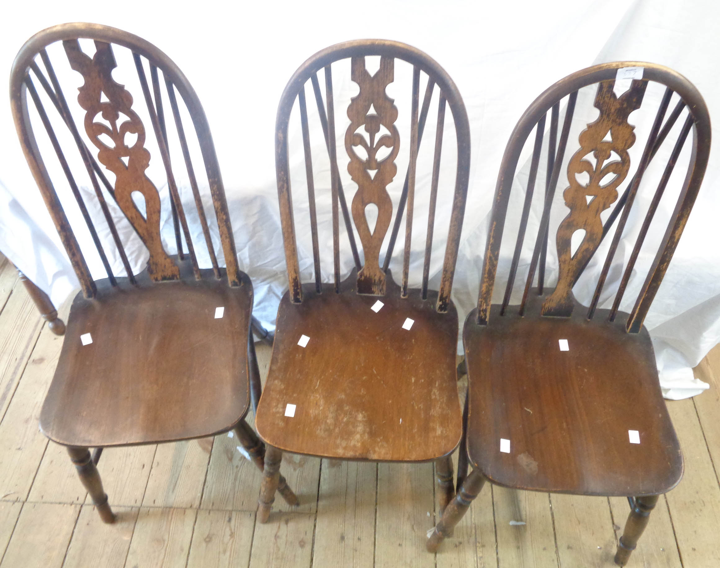 Three matching hoop stick back kitchen chairs - sold with a low table, set on turned legs and