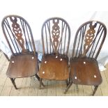 Three matching hoop stick back kitchen chairs - sold with a low table, set on turned legs and