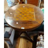 A 66cm Victorian mixed hardwood chess table, set on an associated turned pillar and tripod base