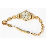 A 375 (9ct.) gold cased Everite lady's wristwatch, on gold pated bracelet