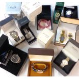 A box containing a collection of assorted modern wristwatches including Swiss Hills lady's and
