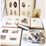 Three late Victorian leather bound cabinet albums containing collections of family photographs