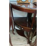 A 55cm 19th Century mahogany corner washstand with small drawer to undertier, set on swept