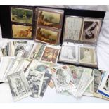 Two ring bound albums containing a collection of early 20th Century and other postcards including