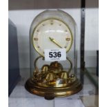 A vintage small Shatz anniversary clock with perspex dome - suspension wire a/f