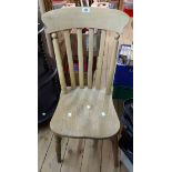 Three matching old lathe back kitchen chairs with moulded solid elm seats, set on ring turned