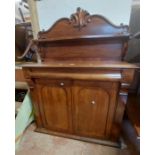 A 1.07m Victorian mahogany chiffonier with shelf to raised back and blind frieze drawer over a