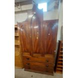 A 1.13m 19th Century mahogany Gothic style two part linen press with central mitre shaped folding