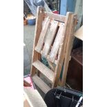 A vintage wooden folding stepladder - for decorative use only